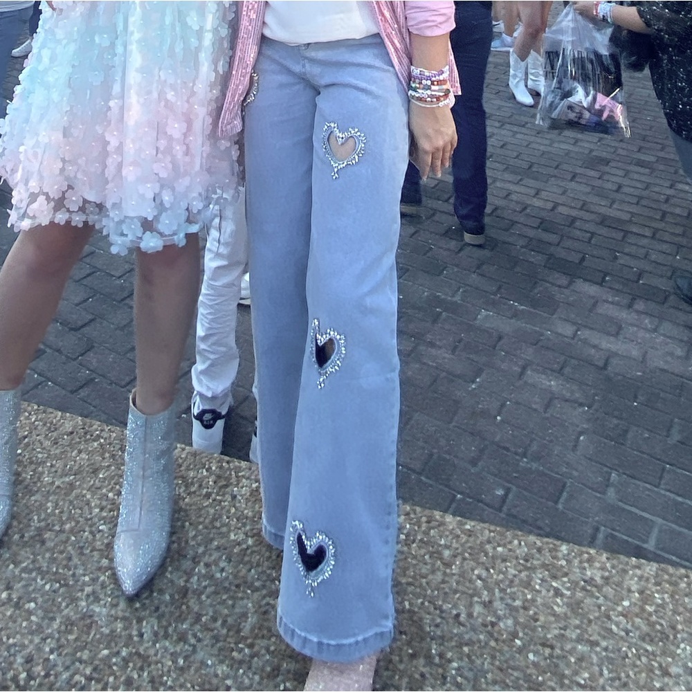 Gem embellished heart cut out jeans.